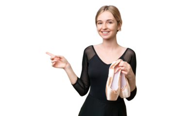 Young English woman practicing ballet over isolated background pointing finger to the side