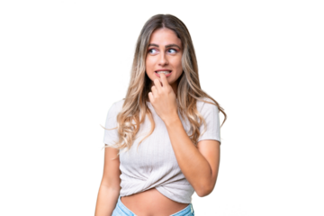 Young Uruguayan woman over isolated background nervous and scared