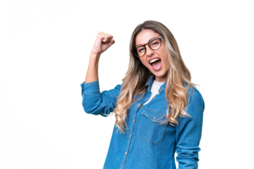 Young Uruguayan woman over isolated background celebrating a victory