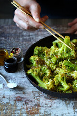 Broccoli baked with sweet and sour sauce. Healthy food.