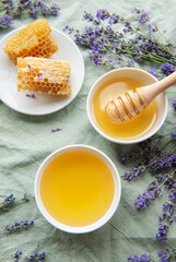 Jar with honey and fresh lavender flowers