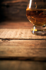 Whisky still life on a wooden background
