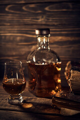 Whisky still life on a wooden background