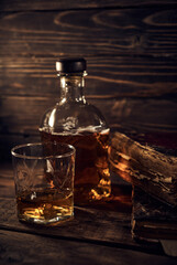 Whisky still life on a wooden background