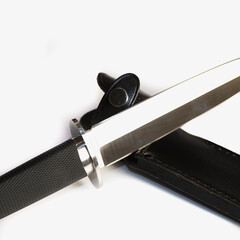 Hunting knife isolated on white background.
souvenir collectible silver dagger with a scabbard,...
