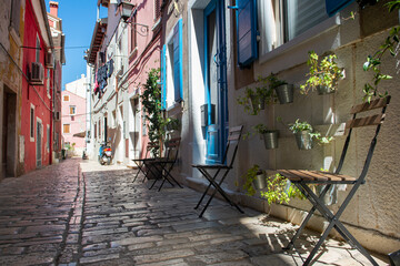 Fototapeta premium A little cobbles street in a Mediterranean country