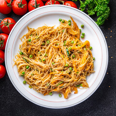 rice noodles vegetables no meat Asian dish fresh funchose snack meal food snack on the table copy space food background rustic top view