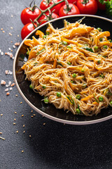 rice noodles vegetables no meat Asian dish fresh funchose snack meal food snack on the table copy space food background rustic top view