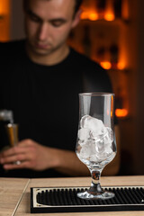 Process of preparing a cocktail bartender's in bar.