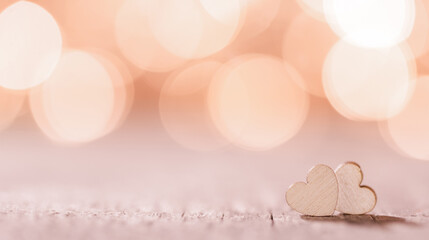 Two hearts on bokeh background - 551268788