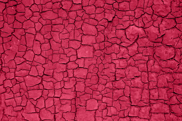 Viva Meganta toned red magenta rustic texture of damage wall door. Vintage abstract field of erased...