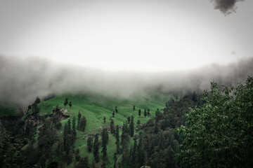 Cloud covered mountains and valleys 