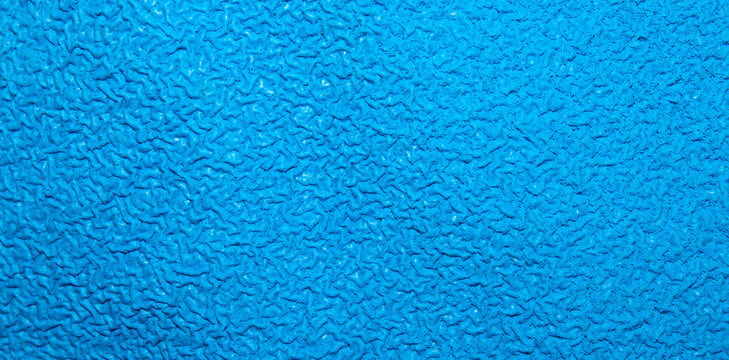 The texture is swollen blue rubber.The texture is blue rubber foam.Sound insulation of the rubberized blue surface.
