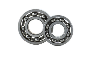 Two ball bearings over transparent background