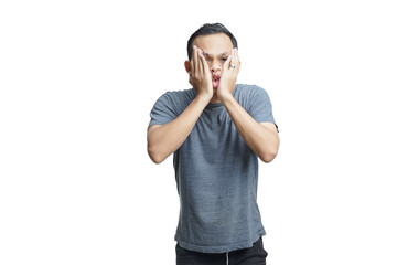 asian man with shocked expression on isolated background