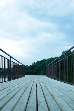 wooden bridge over the river