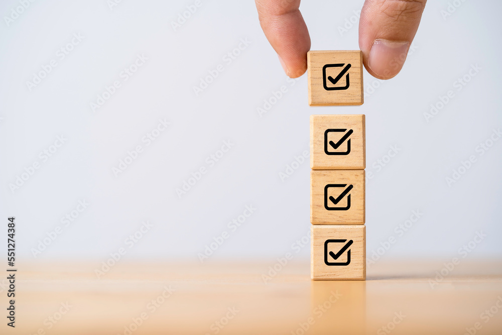 Poster businessman stacking correct sign mark for document approve , project acceptance and quality assuran