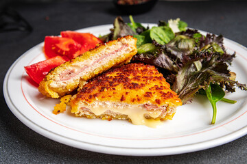 cordon blue meat cutlet chicken, ham, cheese fresh delicious snack meal food on the table copy...