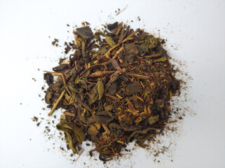 Dry tea leaves isolated on white background