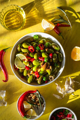 Pickling olive with chili and lemon and garlic and olive oil 