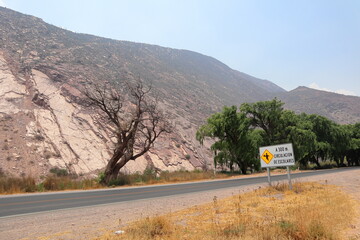  Dirt road lost between mountains. Streets of Purmamarca, Jujuy, Argentina. Mountains of incredible...
