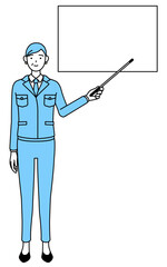 ホワイトボードを指示棒で指す作業着を着たシニア女性（経営者、管理職、工場長）