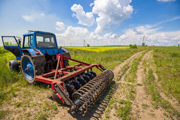 Agriculture. Tractor, Plowing Field on a Farm. Tillage. Agricultural Equipment. Preparing the Soil...