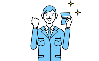 預金通帳を見て喜ぶ作業着を着たシニア女性（経営者、管理職、工場長）