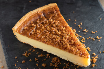 Slice of Parisian Flan (French Custard Pie) Classic tart