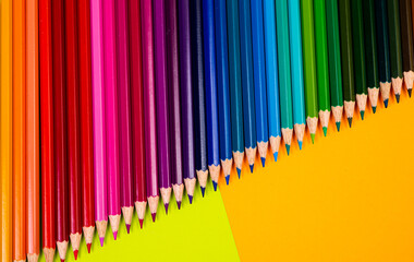 multi-colored pencils on multi-colored background, Close up, copy space, Modern art. Modern design