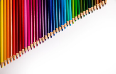 multi-colored pencils on multi-colored background, Close up, copy space, Modern art. Modern design