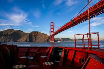 Ship passing Golden Gate Bridge