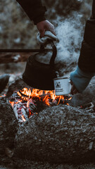 Cooking with campfire, hot tea