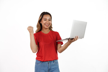 Studio shot of pretty Asian woman with red t-shirt isolated on white background. Using laptop