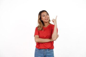 Studio shot of pretty Asian woman with red t-shirt isolated on white background. Thinking