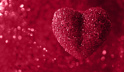 Valentine's day concept with magenta heart on viva magenta background with bokeh. Valentine's day or Wedding love greeting card