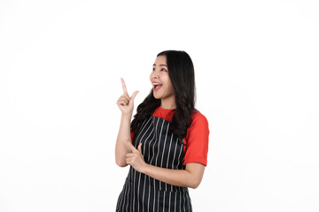 Recommend, pointing to discount, Food shop owner concept, Smiling young confident asian woman in black apron and red t-shirt isolated on white background.