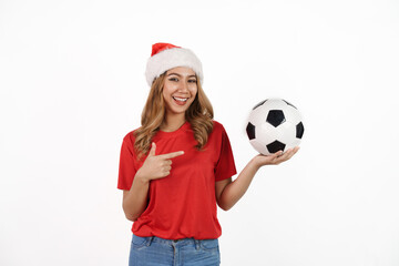 Happy asian woman in santa hat and red t-shirt isolated on white background. Celebrate World Cup victory, soccer fans concept.