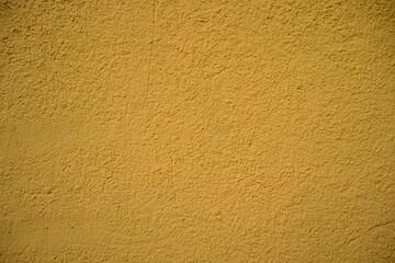 Abstract contemporary texture background. Yellow texture for designer background.  Colorful old dirty wall.