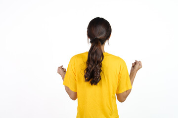 Beautiful female sports fan soccer fans brazil isolated on white background. Rear or back view