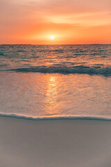 Closeup sea sand beach. Beautiful beach landscape. Inspire tropical beach seascape horizon. Dreamy sunset sky calm tranquil relax sunset summer mood. Positive energy, meditation summer tropical island