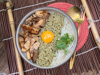 Vegetable noodles with Stir fried pork with black soy sauce and blanched bean sprouts
