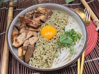 Vegetable noodles with Stir fried pork with black soy sauce and blanched bean sprouts