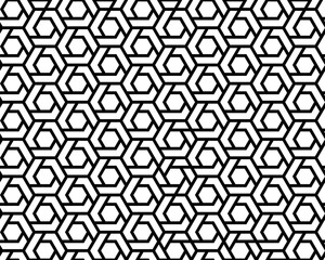 Geometric black hexagons seamless pattern on a white background, creative design template