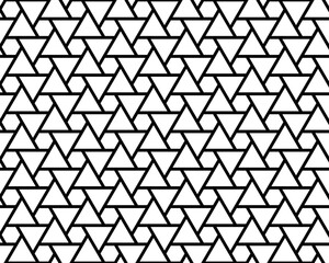 Geometric black triangles and hexagons seamless pattern on a white background, creative design template