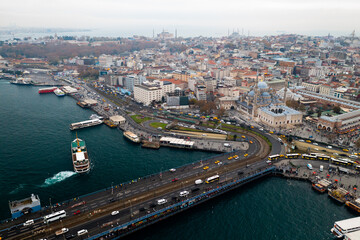 Fototapeta premium People on Galata Bridge in Istanbul, Turkey. Galata Bridge and Eminonu are the most popular destinations for entertainment and travel of Istanbul.