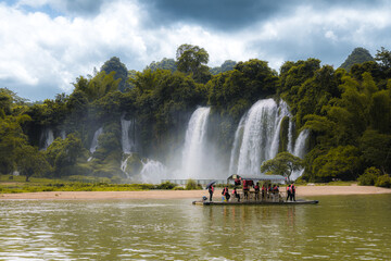 Raft in front of Ban Gioc-Detian waterfall, on the border of China and East Vietnam.