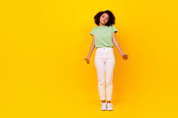 Fototapeta na wymiar Full body size photo of young adorable gorgeous nice woman palms out dont know indifferent your problems isolated on yellow color background