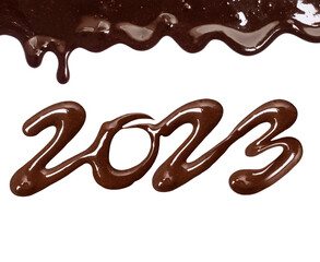 Date of the new year 2023 written by melted chocolate on a white background