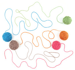 Colorful cotton thread balls isolated on white background. Set of five color (orange, pink, grey,...
